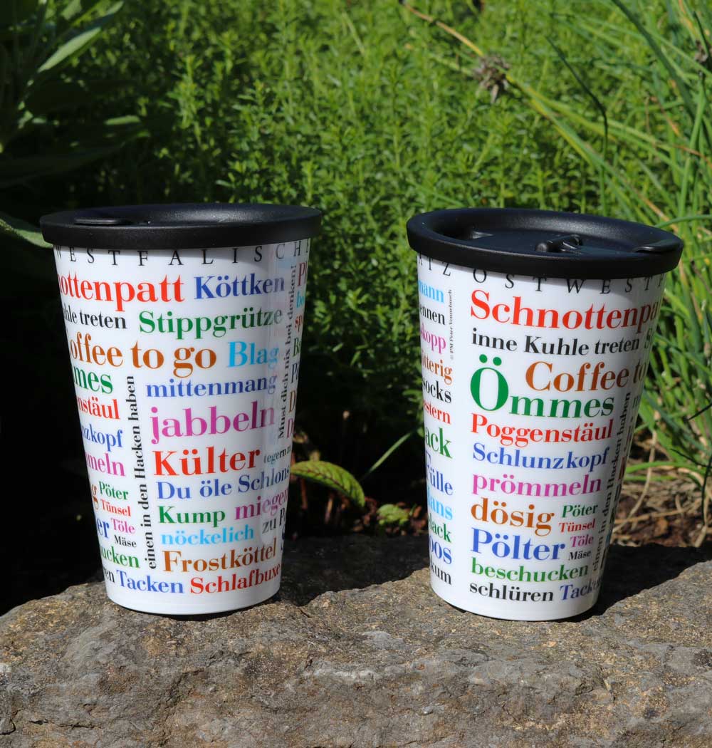 ORNAMIN-Coffee-to-go-Mehrwegbecher-Referenz-Ostwestfählischer-Wortschatz-Becher Zwei ORNAMIN Coffee to-go Mehrwegbecher mit Ostwestfählischen Wortschatz Dekor