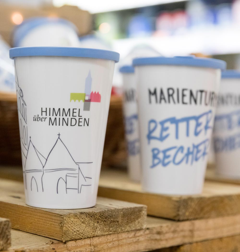 ORNAMIN-Coffee-to-go-Mehrwegbecher-Referenz-Marienturm-Retterbecher-Referenz ORNAMIN Mehrwegbecher mit "Retterbecher" Marinkirchturm Minden Motiv