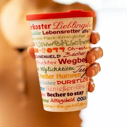 Mehrweg Coffee to-go Becher der ORNAMIN DRK Kooperation